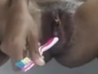 Teen Masturbating In Shower With ToothBrush